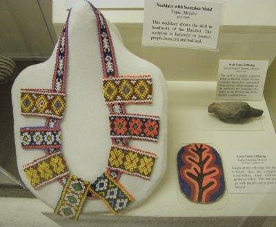 Restore Art. Museum exhibit conditions. Mexican beadwork on display.